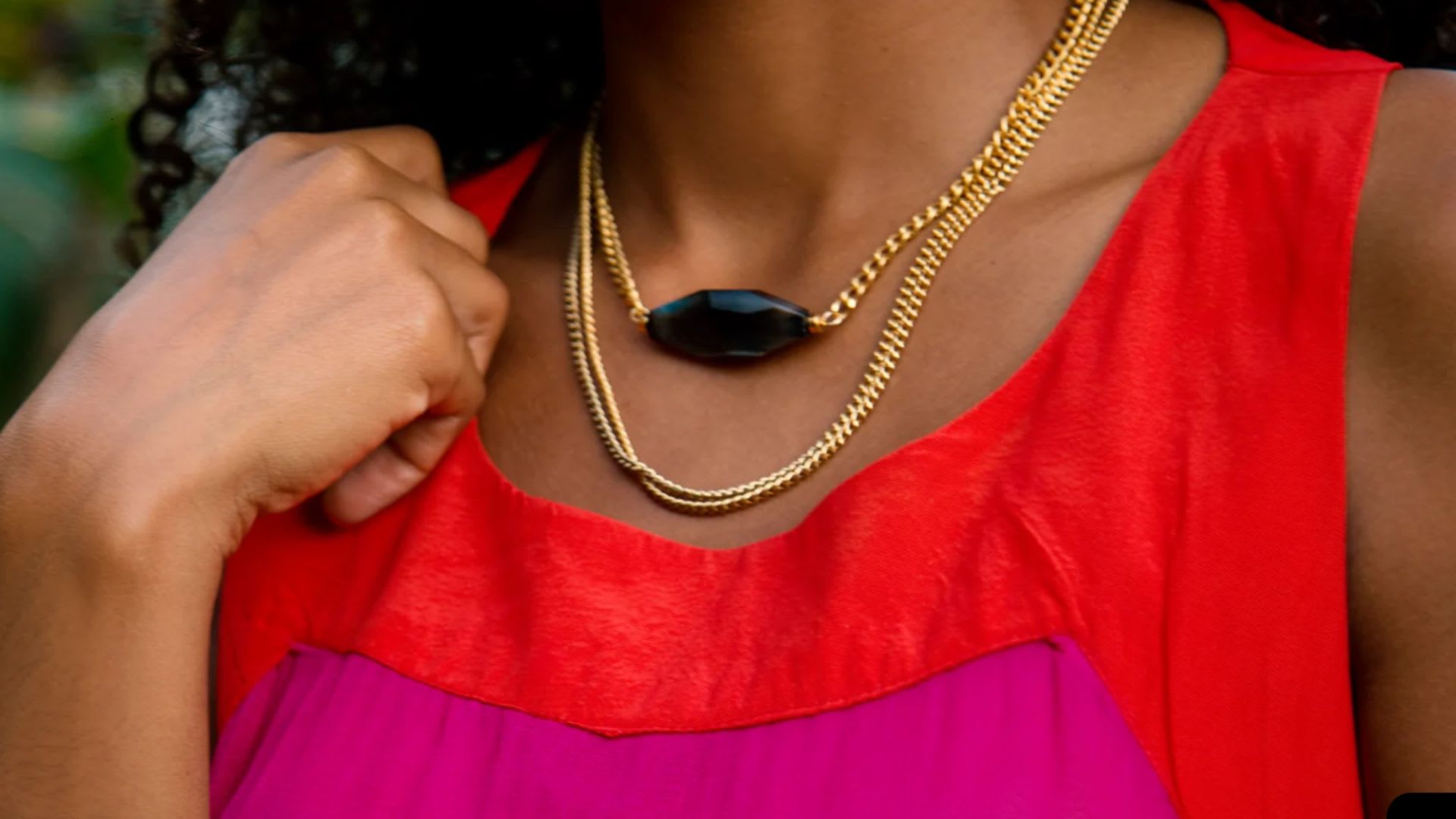 Women wearing jewelry from Monoxide