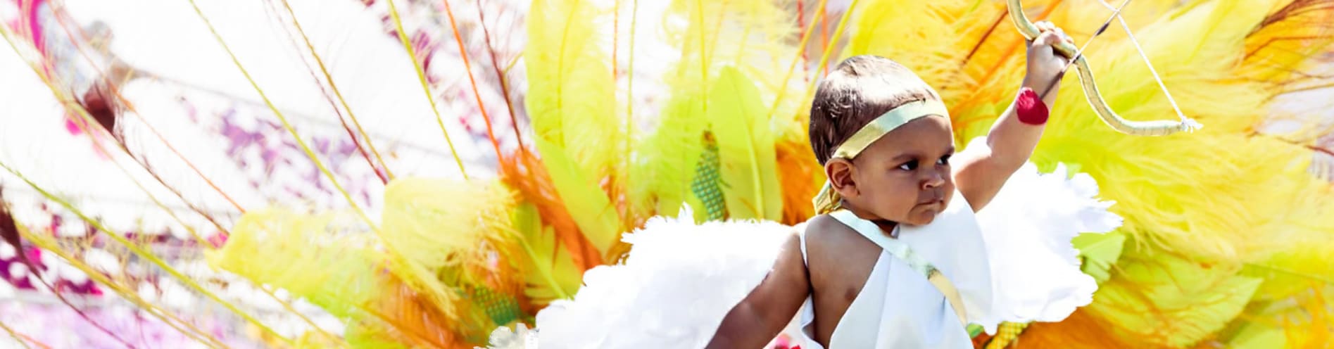 Junior Carnival little kid with wings and bow and arrow