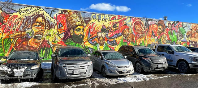 Visit Little Jamaica to explore Adrian Hayles Reggae Lane mural paying homage to Caribbean music