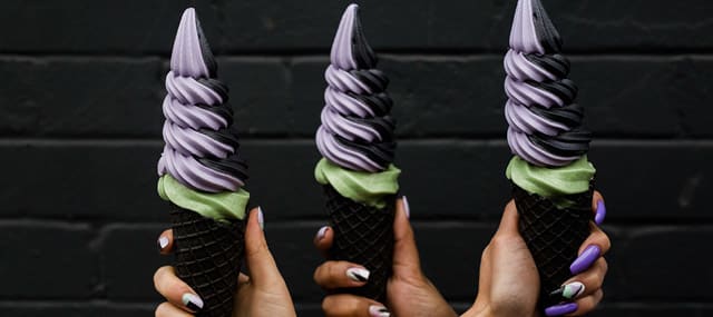 Grab a rainbow coloured soft serve ice cream cone from iHalo Krunch in Toronto