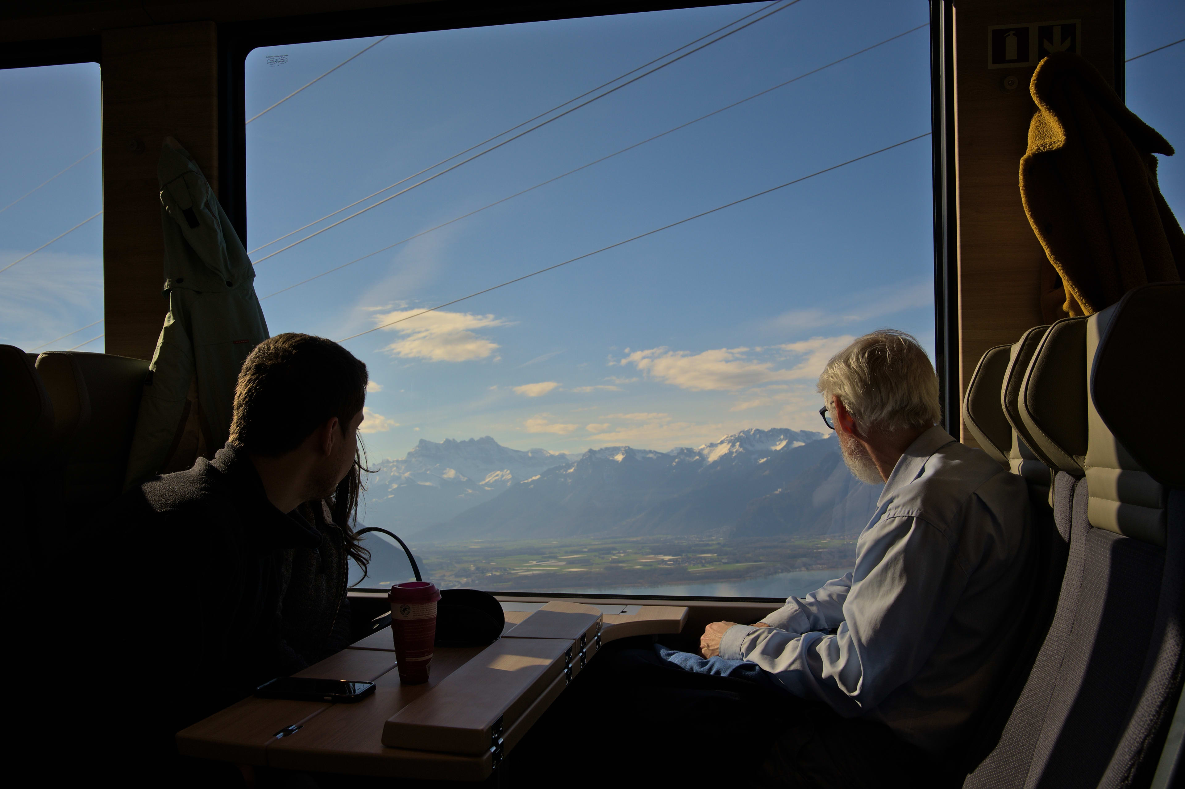 Take in the beautiful views of the Swiss Alps aboard the panoramic Golden Pass scenic train.