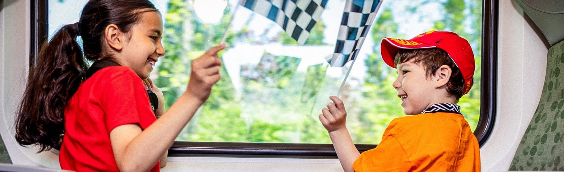 A family taking to the GO train to the Markham Indy.