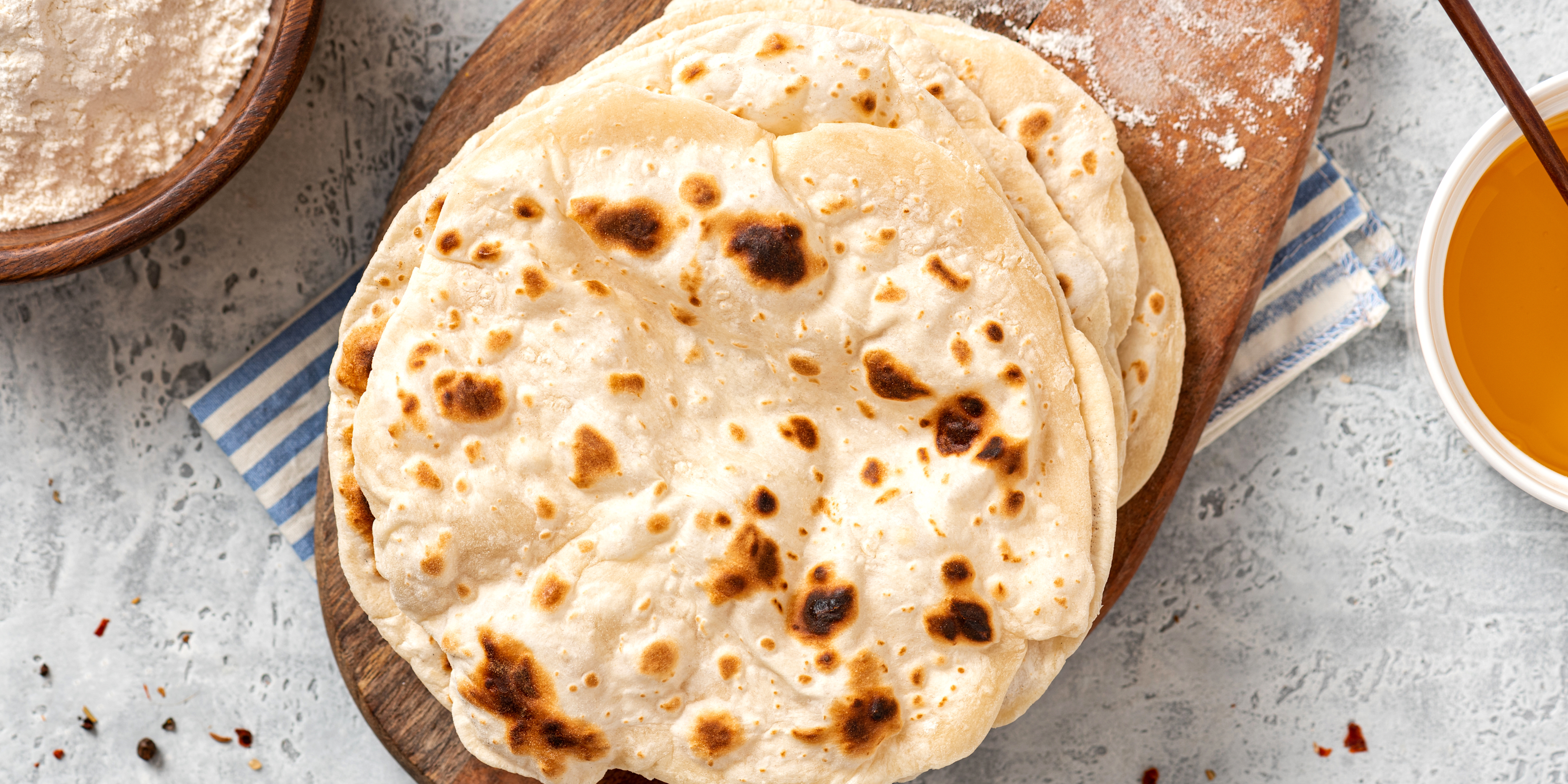 Roti on a wooden plate