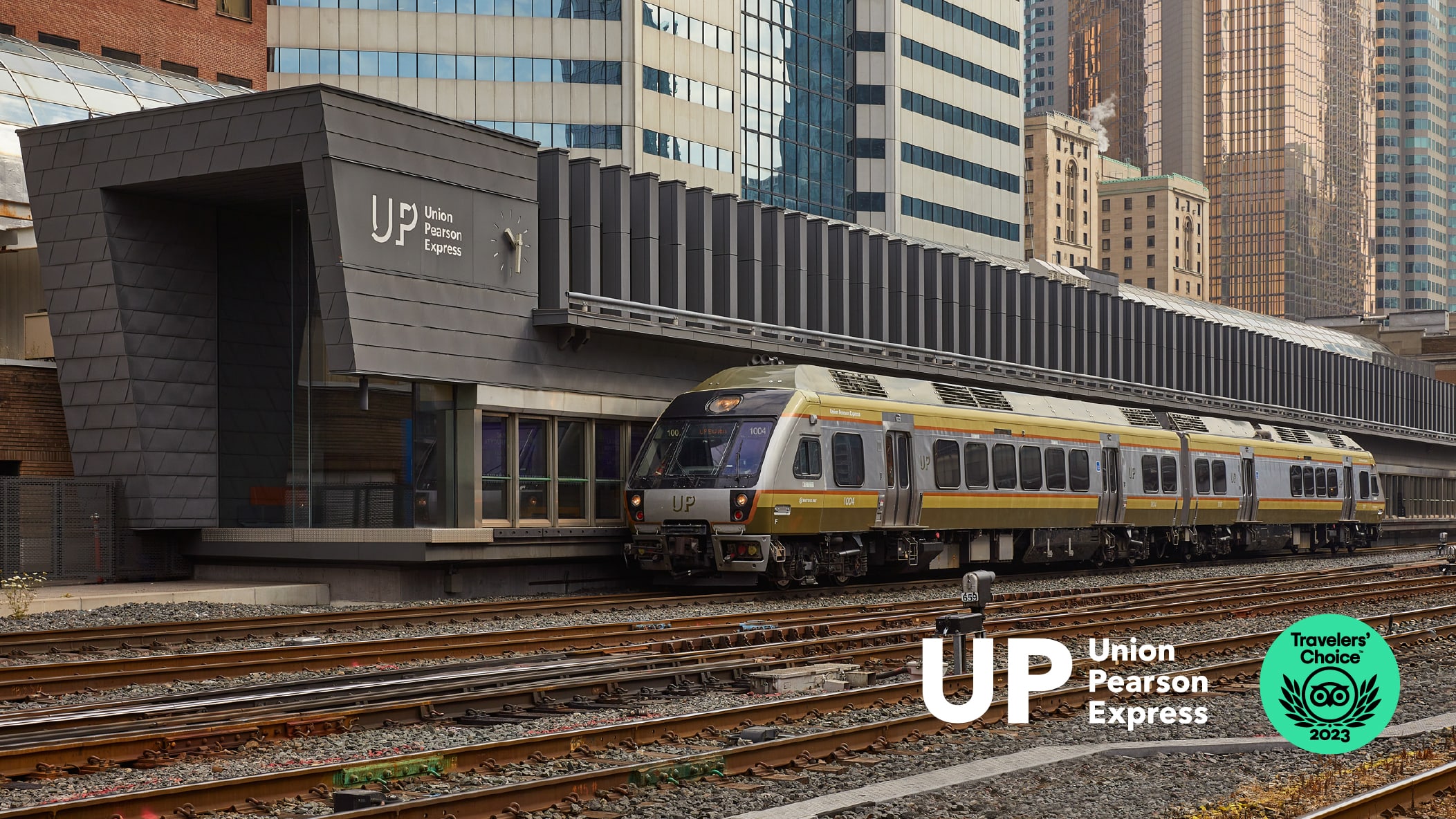UP Express train at Union Station with UP logo and Tripadvisor logo