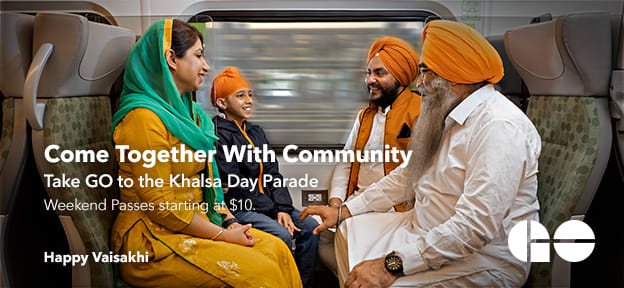 Family sitting on GO Train