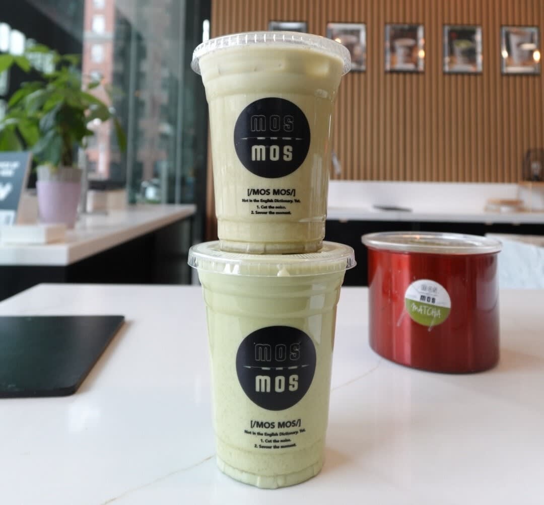 Mos Mos iced matcha lattes stacked on top of each other