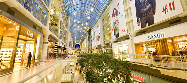 Eaton Centre second floor, shopping mall line with shops on the left and right