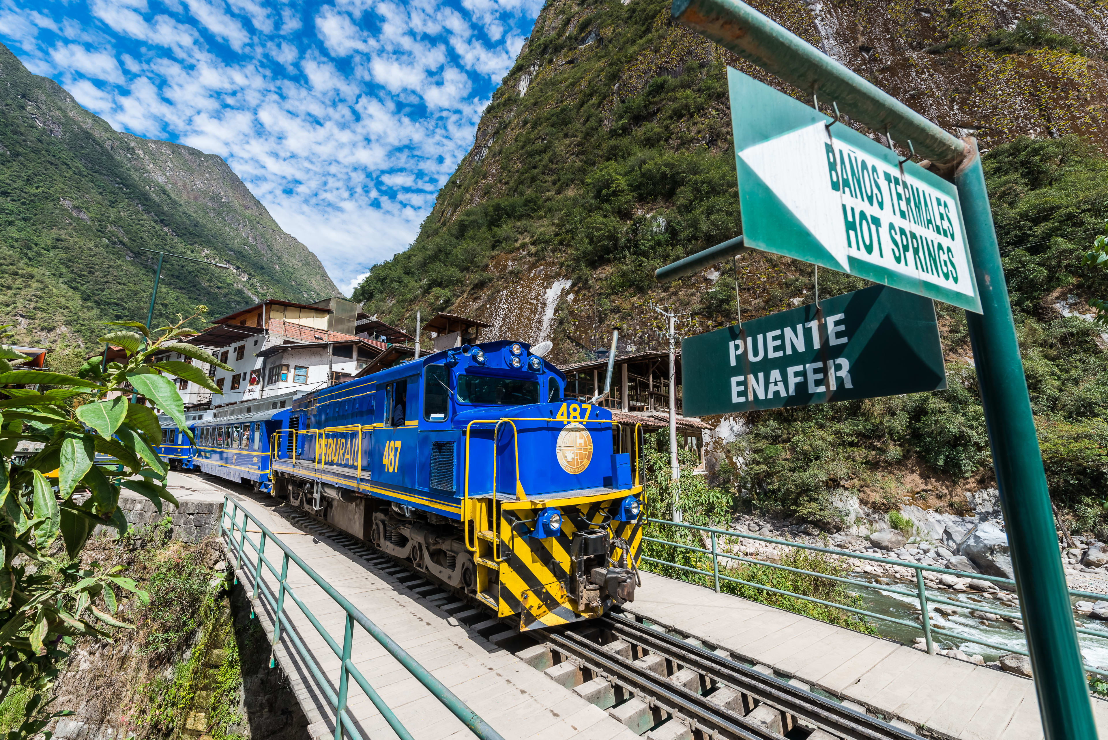 Train to Machu Picchu on trains going through mountains