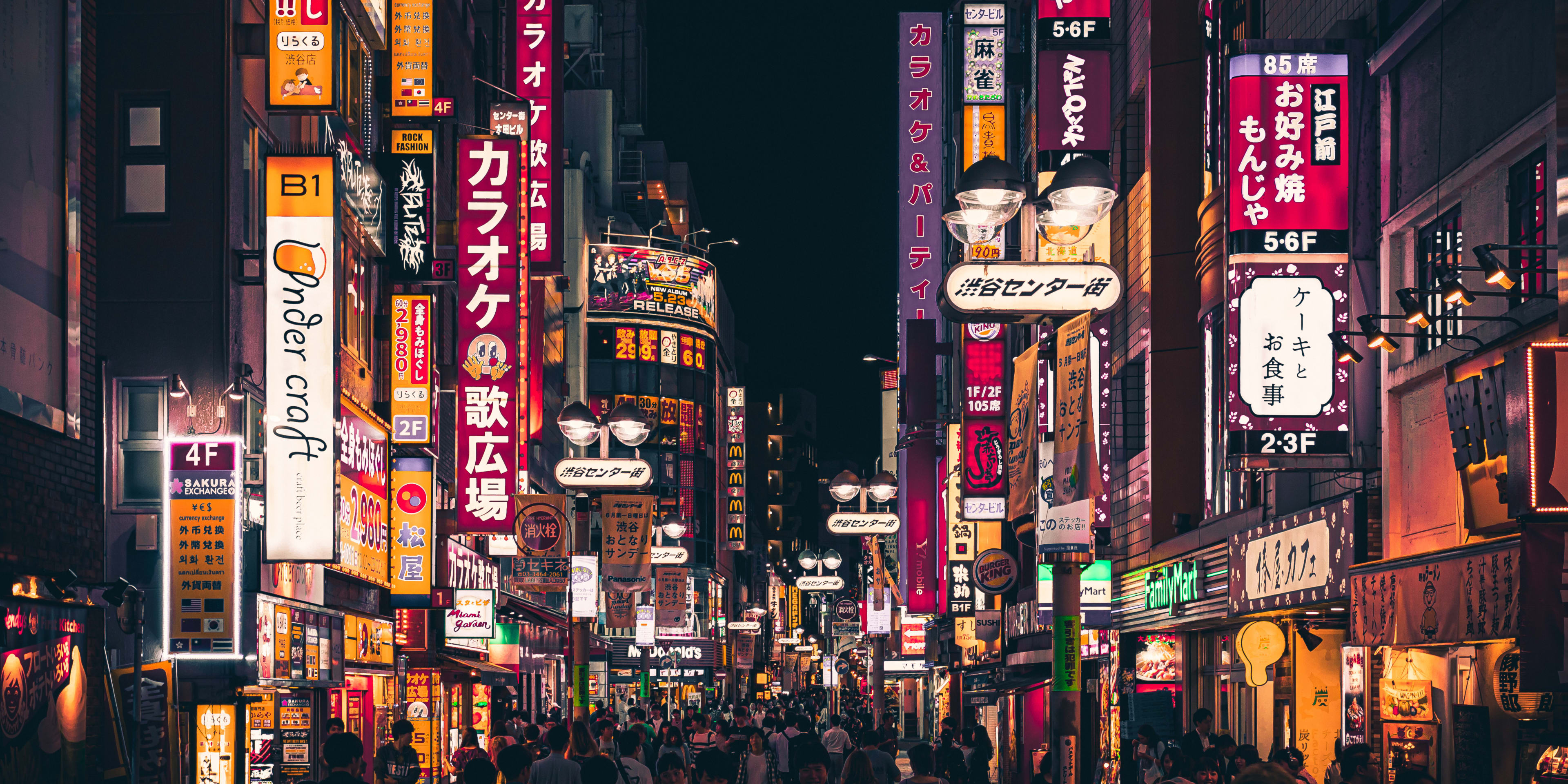 Busy street at night in Tokyo, Japan