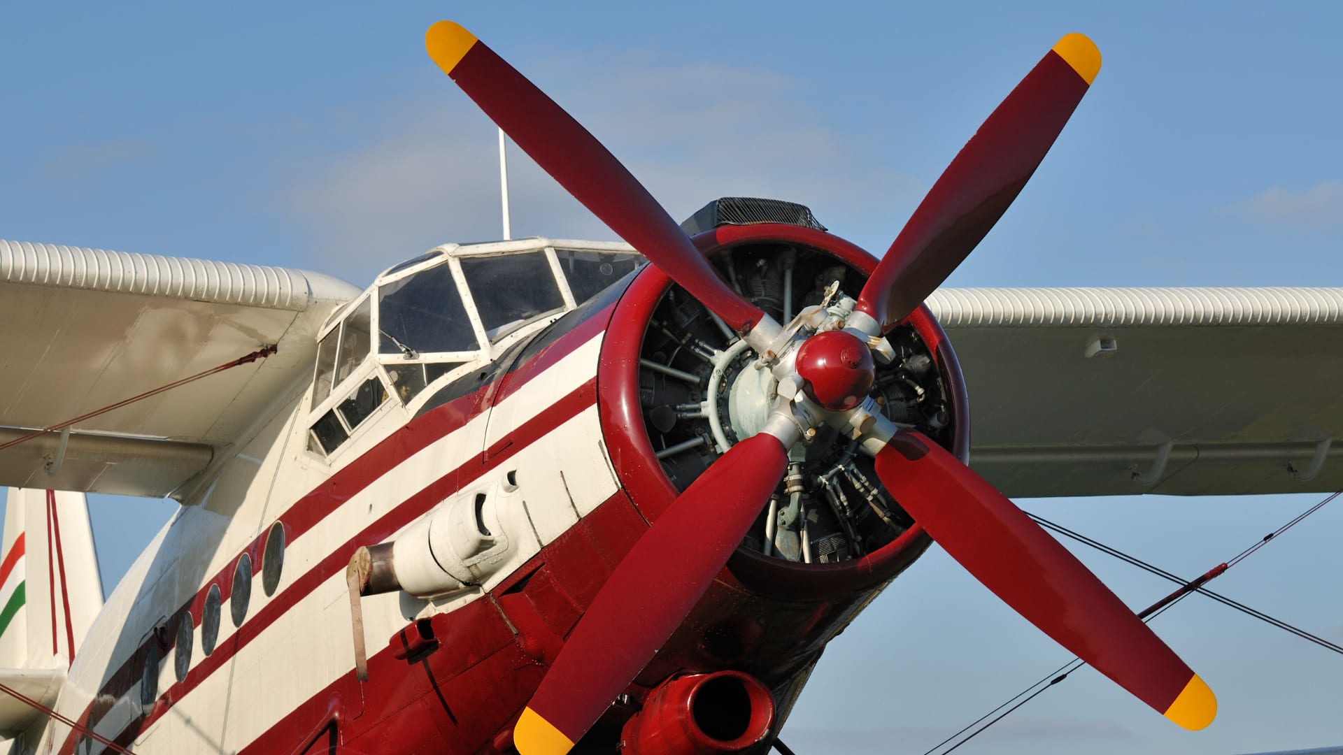 Red and white biplane