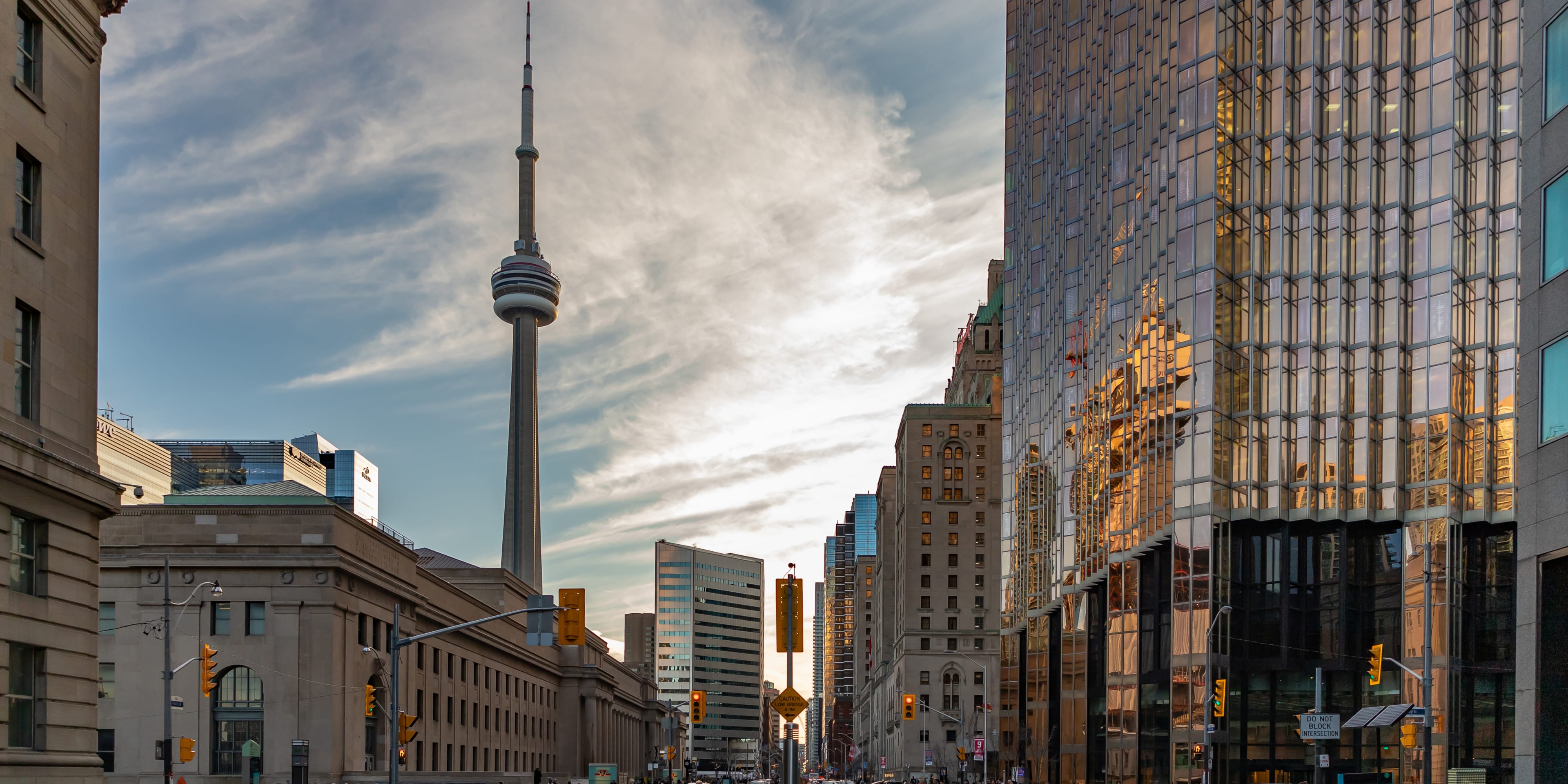 Downtown Toronto view look down Front Street at Union Station and CN Tower