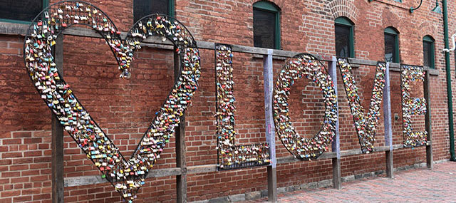 snap pics with your sweetheart at The Distillery District Love Sign, made from many colourful locks