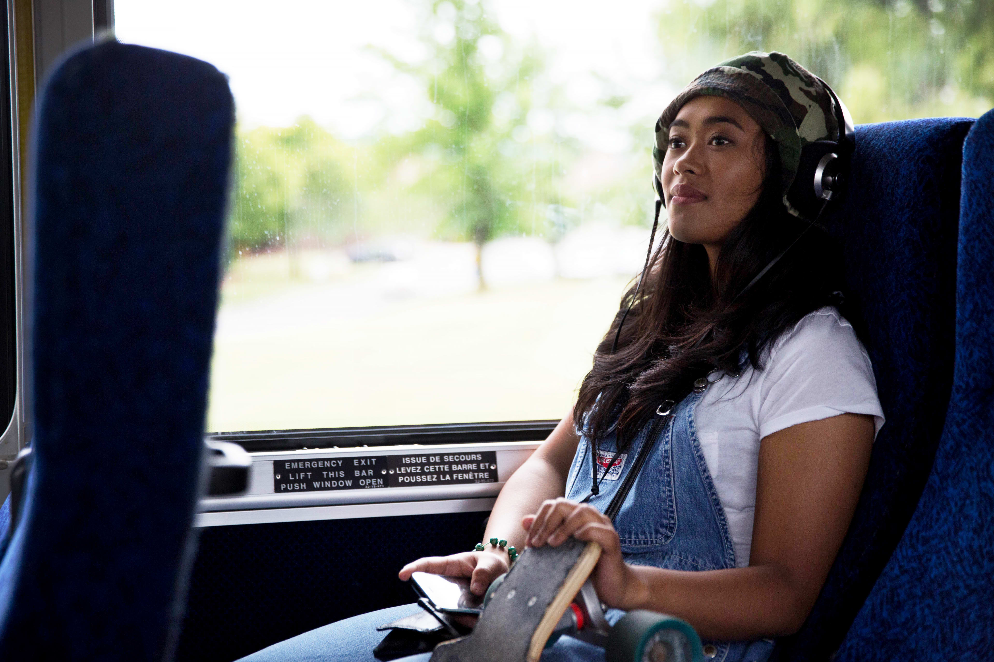 Woman sitting on GO Bus