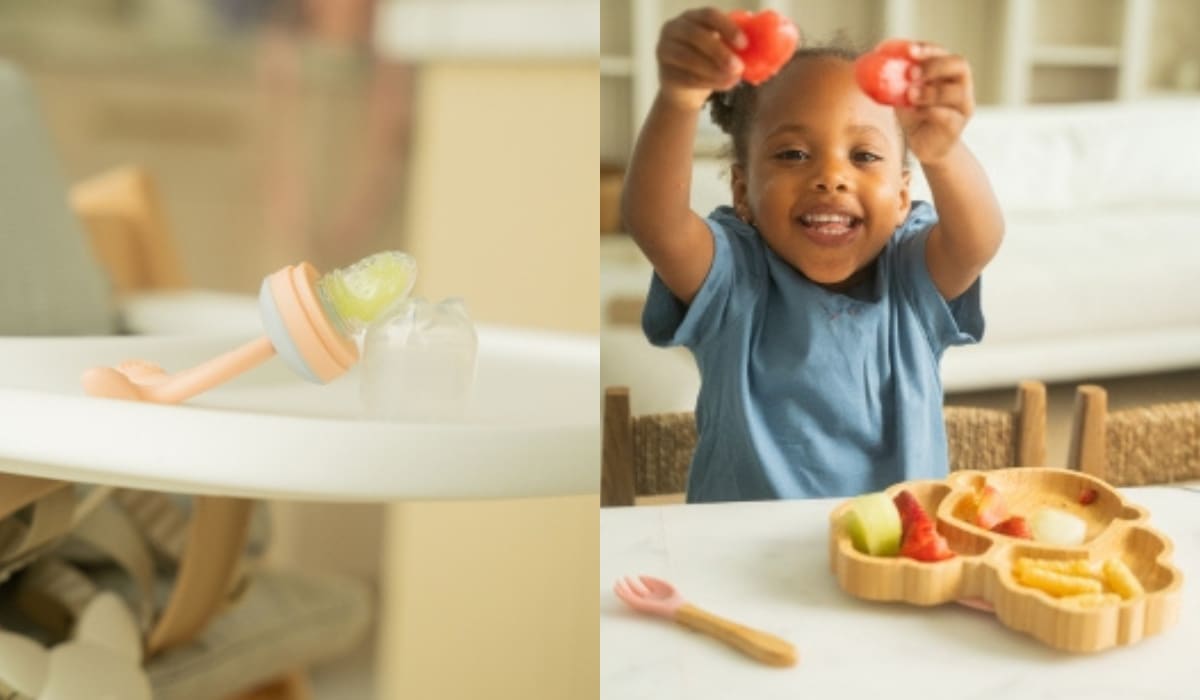 Baby pacifier and little girl posting with fruit on bamboo plate from Trippin' Along