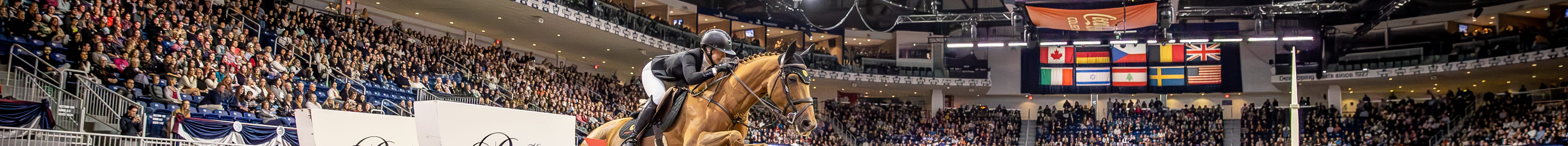 Horse jumping competition at the Royal Agricultural Winter Fair in Toronto.