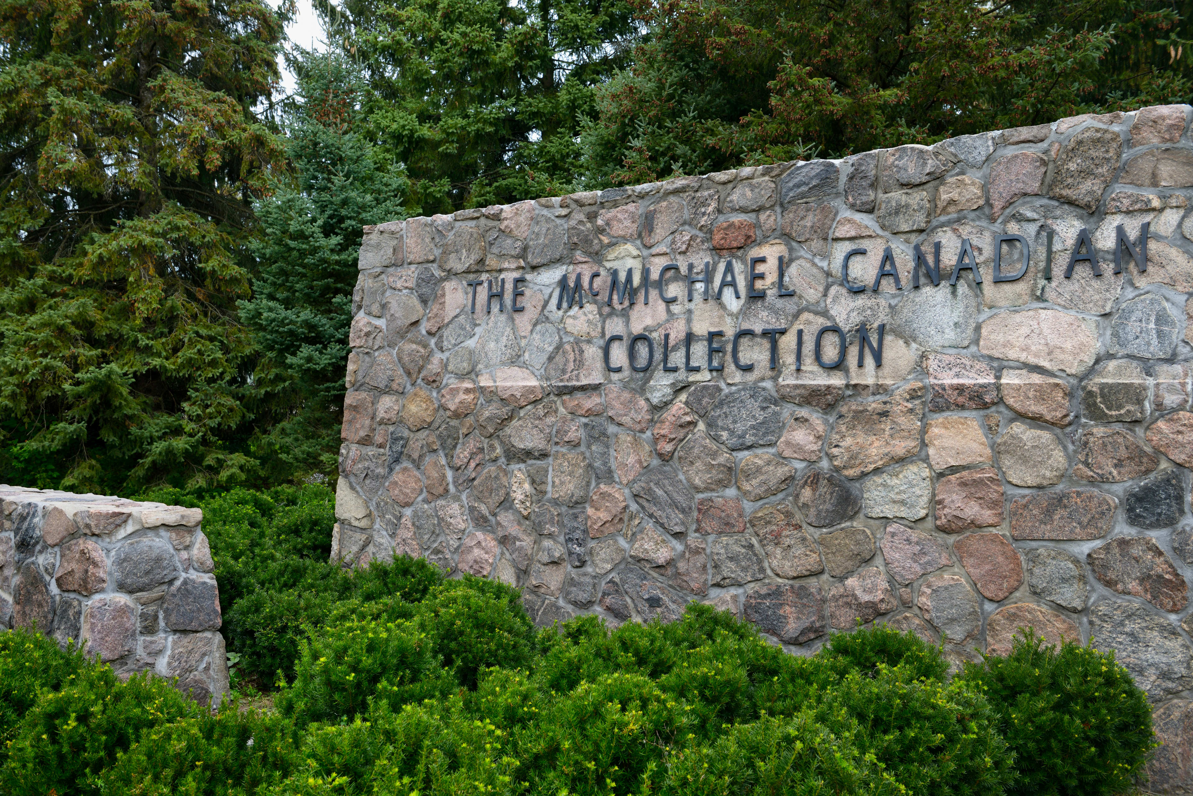 McMichael Canadian Collection sign outside surrounded by trees