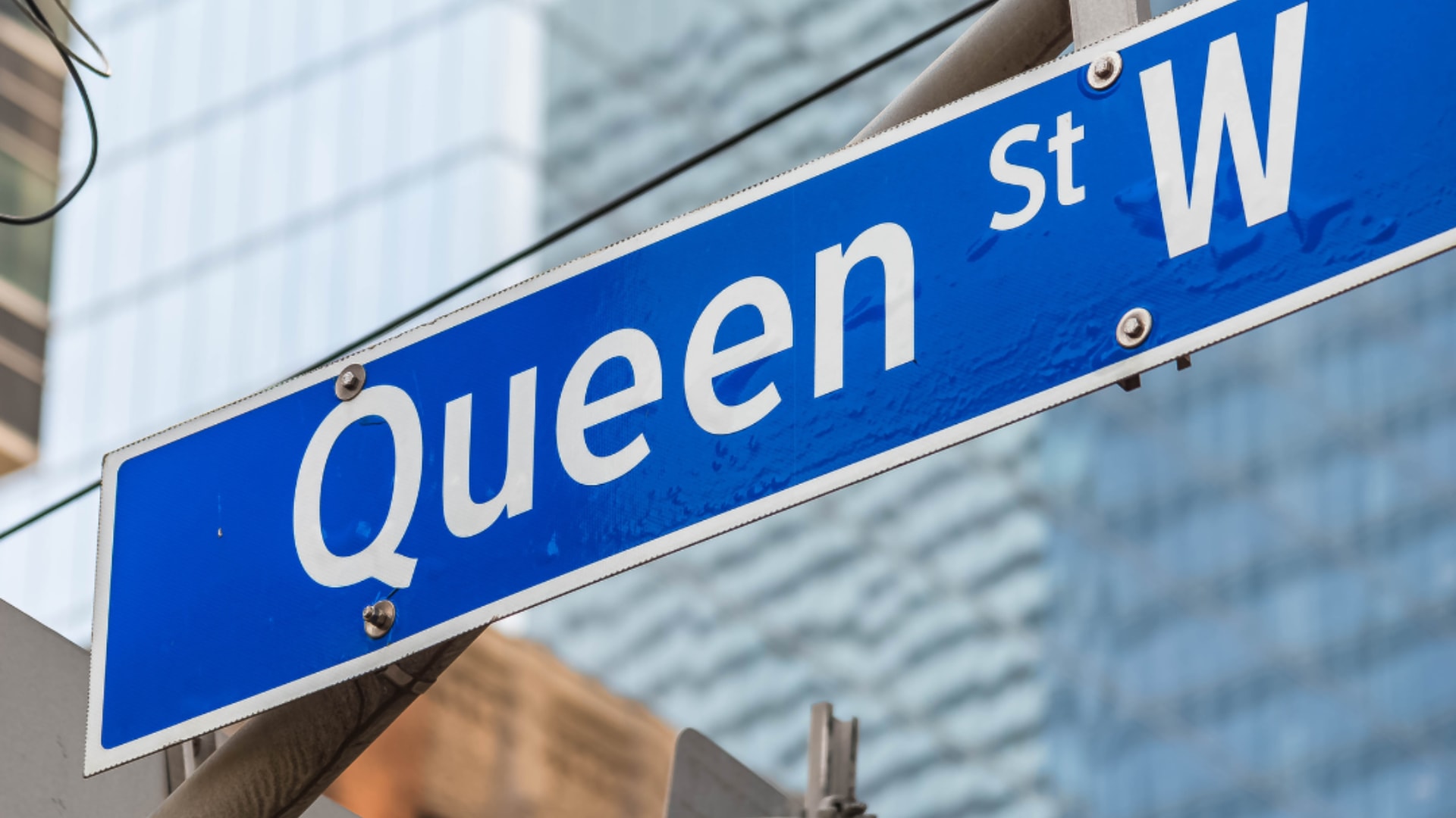 Street sign of Queen Street West