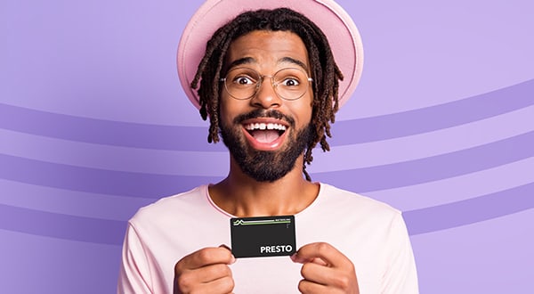 Man holding a PRESTO card on a purple background