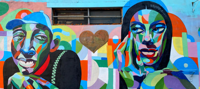 Artist Phillip Saunders’ colourful large scale murals are full of abstract mosaic-like aptterns